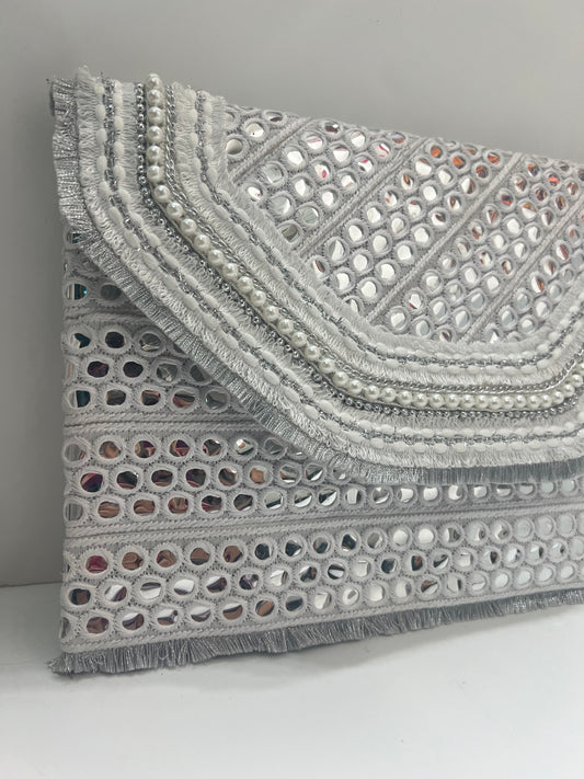 White mirrors clutch