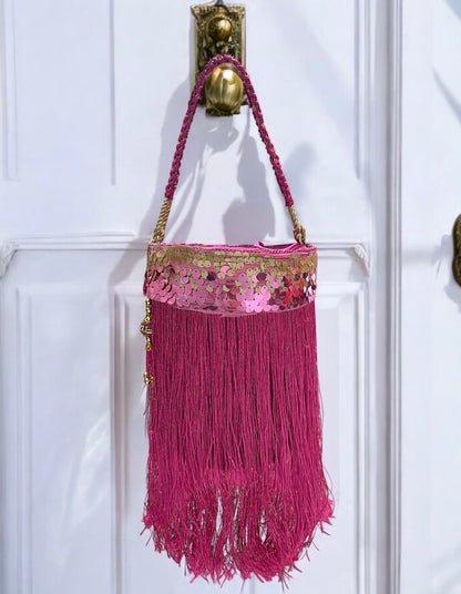 Hot pink tassels cylinder bag