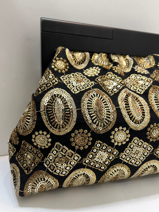 Midnight gold clutch