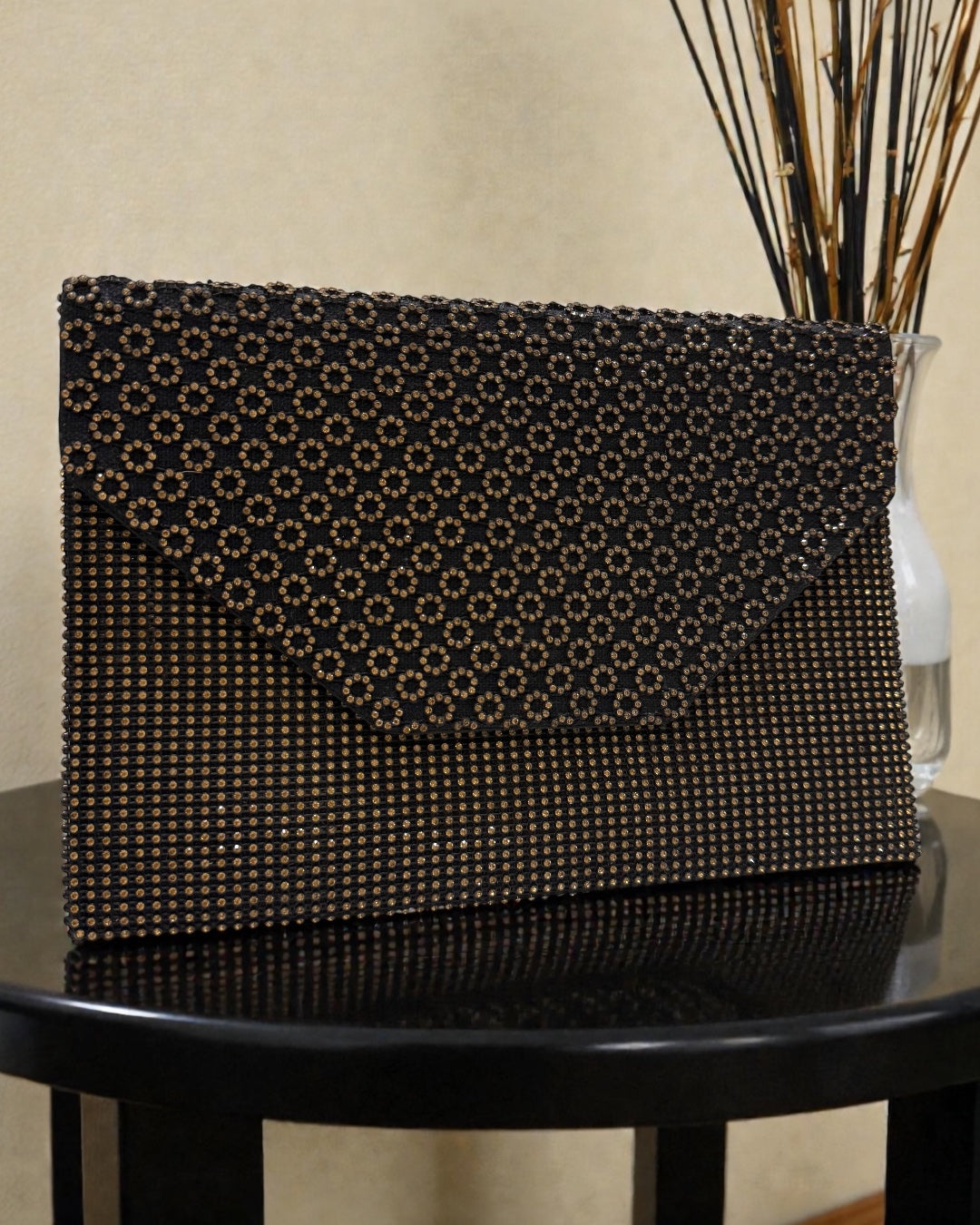 Golden strassy clutch