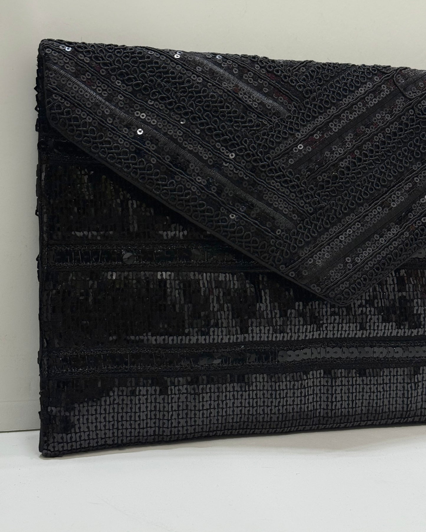 All in black clutch