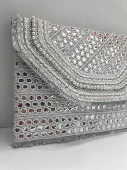 White mirrors clutch