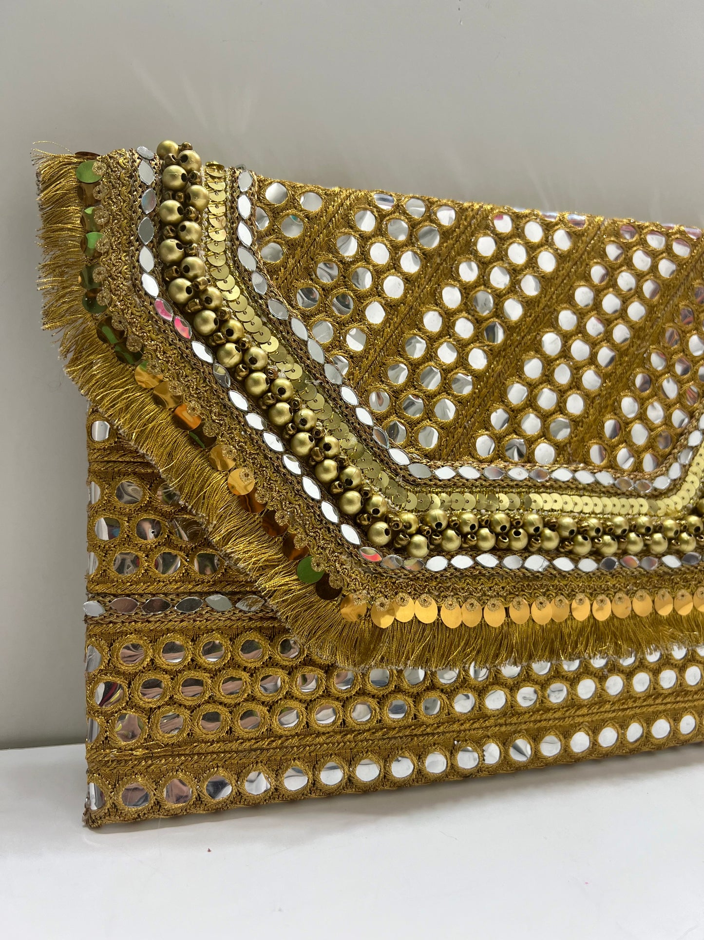 Golden mirrors clutch