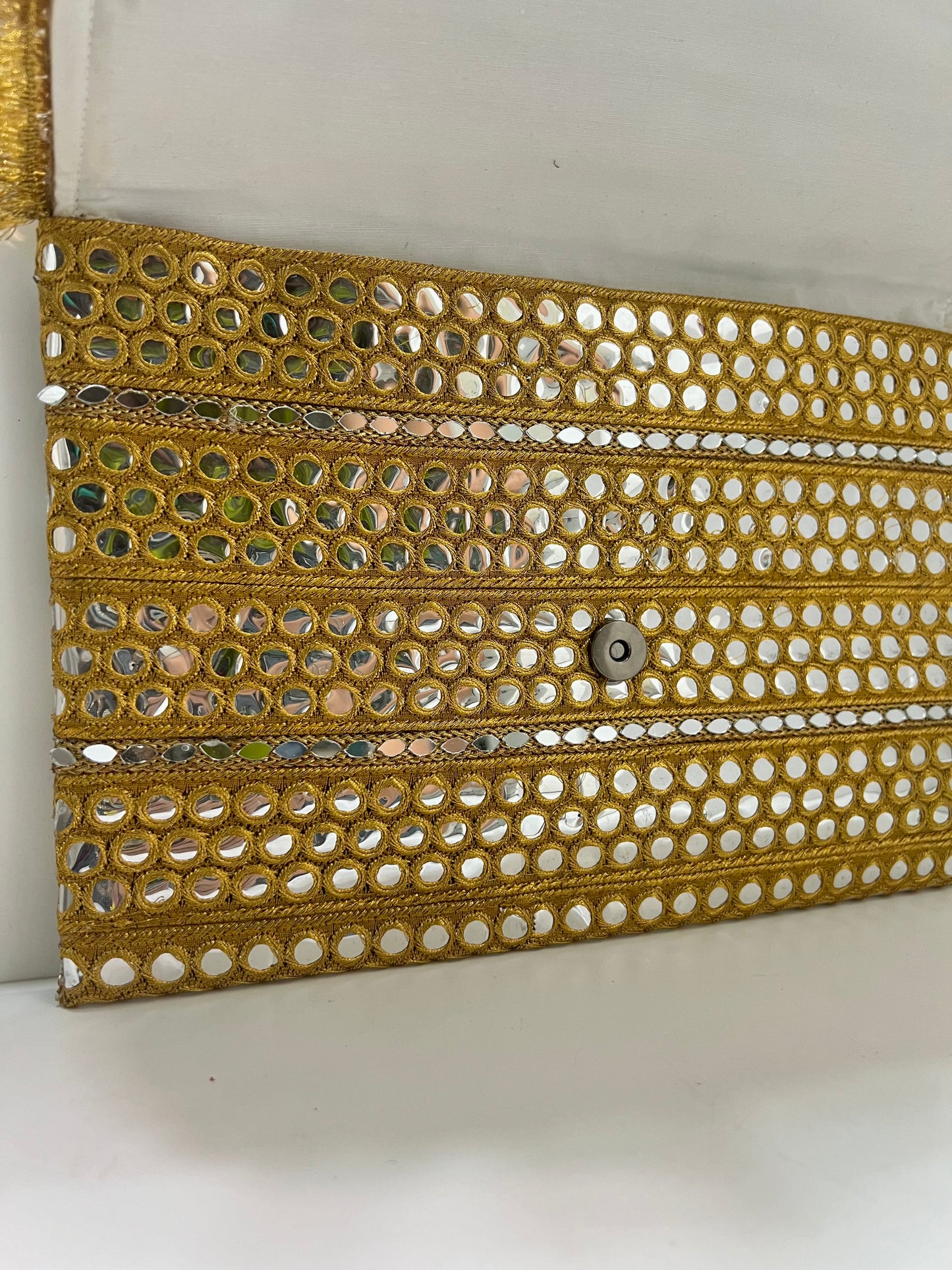 Golden mirrors clutch