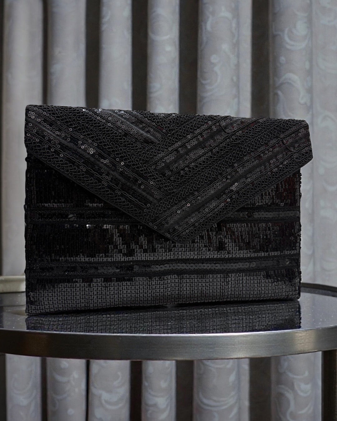 All in black clutch
