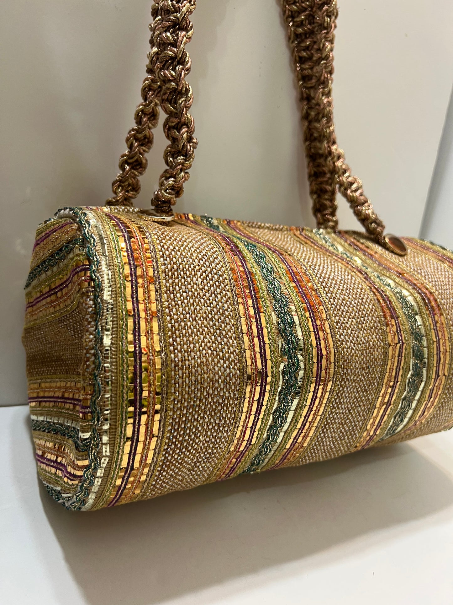 Golden but colorful cylinder bag