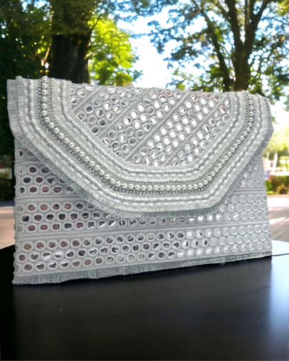 White mirrors clutch