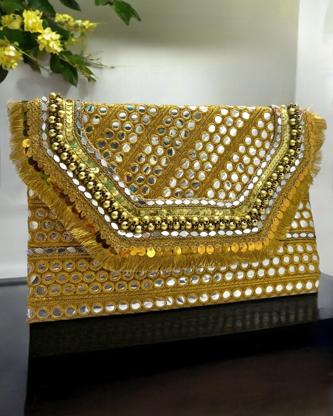 Golden mirrors clutch