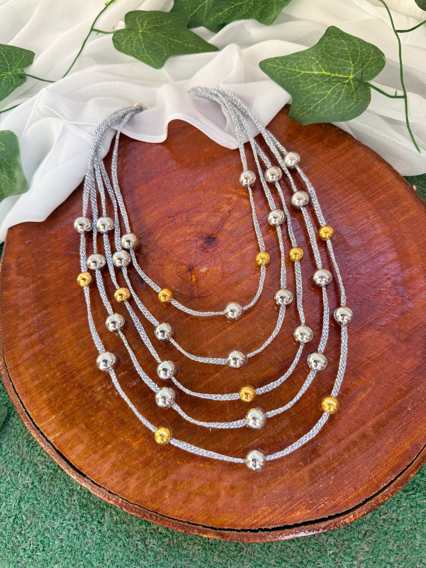 Silver and gold layered necklace