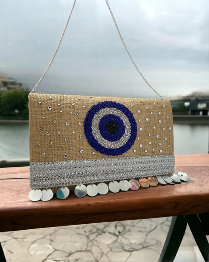 Evil eye clutch
