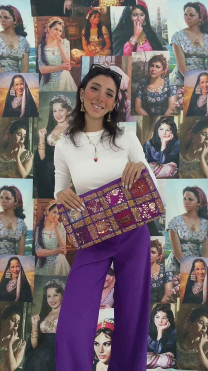 purple embroidered clutch