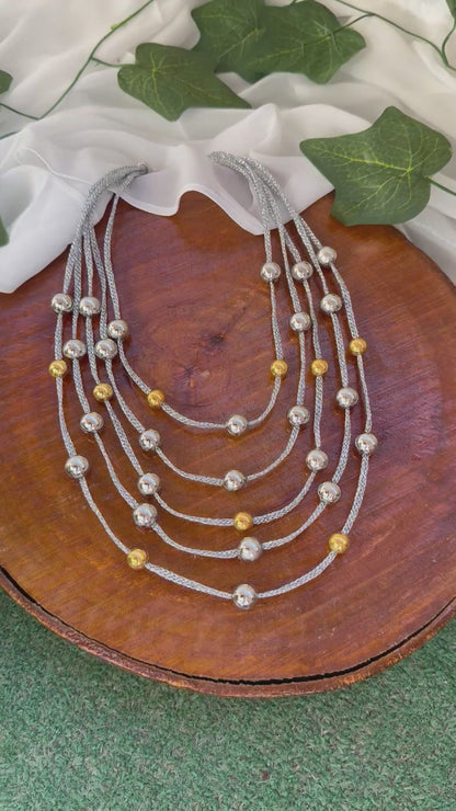 Silver and gold layered necklace